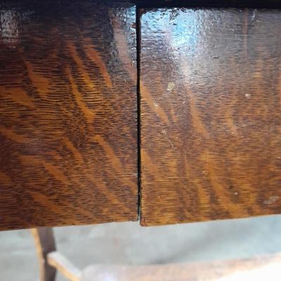 Antique two-tiered table with a drawer