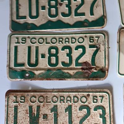 Old 1957 and 67 license plates