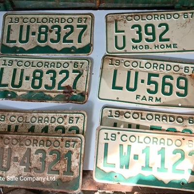 Old 1957 and 67 license plates