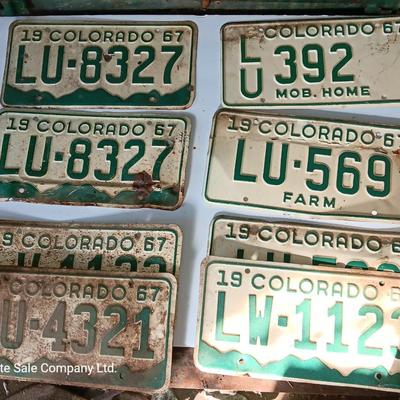 Old 1957 and 67 license plates