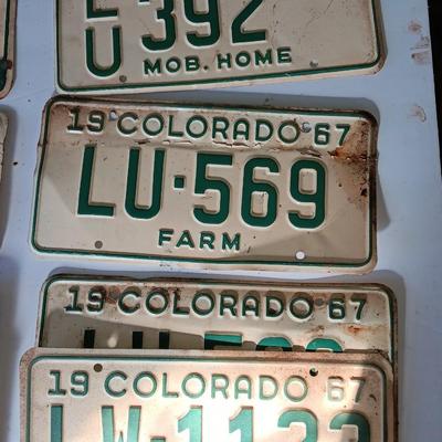 Old 1957 and 67 license plates