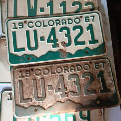 Old 1957 and 67 license plates