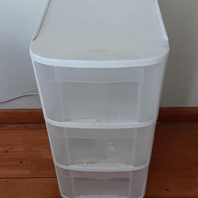Plastic three drawer storage caddy on wheels