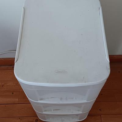 Plastic three drawer storage caddy on wheels