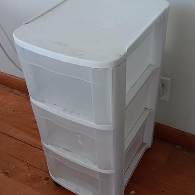 Plastic three drawer storage caddy on wheels