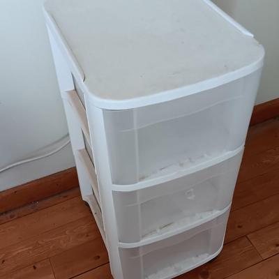 Plastic three drawer storage caddy on wheels
