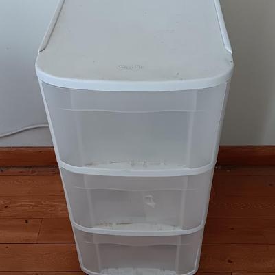 Plastic three drawer storage caddy on wheels