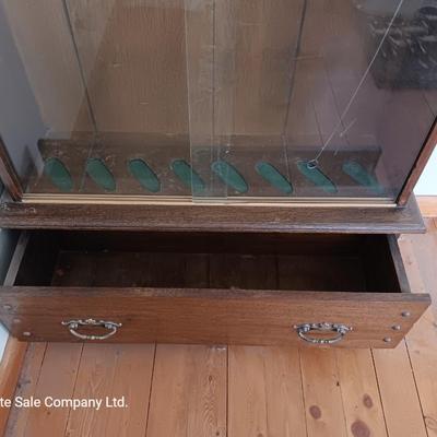 Glass door gun cabinet with drawer - holds 8 rifles.