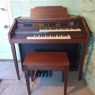 Beautiful electric Lowrey Organ with bench and music books