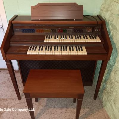 Beautiful electric Lowrey Organ with bench and music books