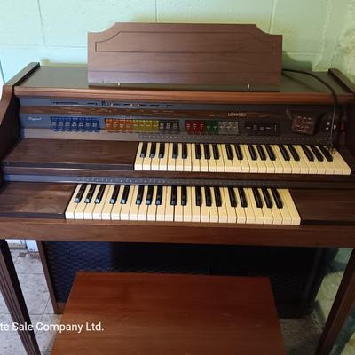 Beautiful electric Lowrey Organ with bench and music books