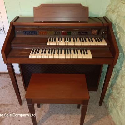 Beautiful electric Lowrey Organ with bench and music books