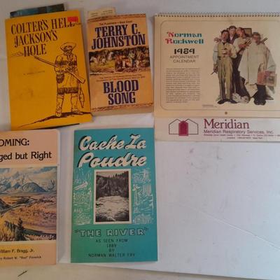 Collection of books - Cache La Poudre - Wyoming - Jackson hole - and others