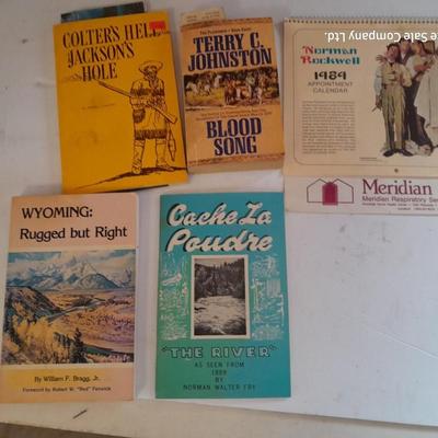 Collection of books - Cache La Poudre - Wyoming - Jackson hole - and others