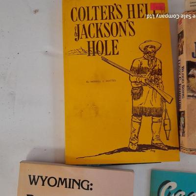 Collection of books - Cache La Poudre - Wyoming - Jackson hole - and others