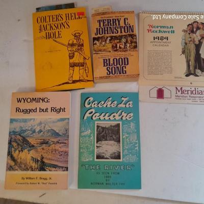 Collection of books - Cache La Poudre - Wyoming - Jackson hole - and others
