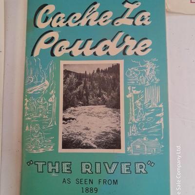 Collection of books - Cache La Poudre - Wyoming - Jackson hole - and others