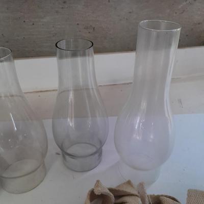 Four oil lantern glass globes / chimney with wicks and 2 vintage tops