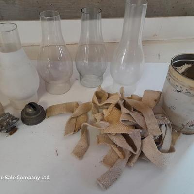Four oil lantern glass globes / chimney with wicks and 2 vintage tops