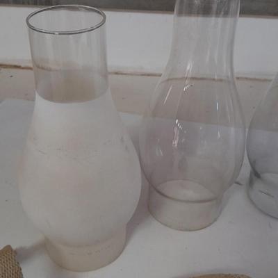 Four oil lantern glass globes / chimney with wicks and 2 vintage tops