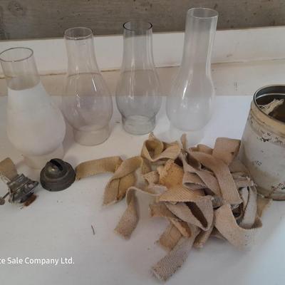 Four oil lantern glass globes / chimney with wicks and 2 vintage tops