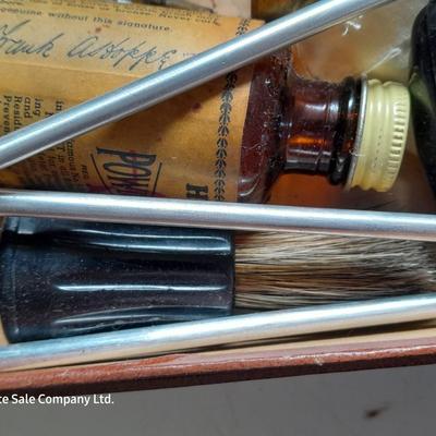 Vintage gun cleaning kit with tools and accessories