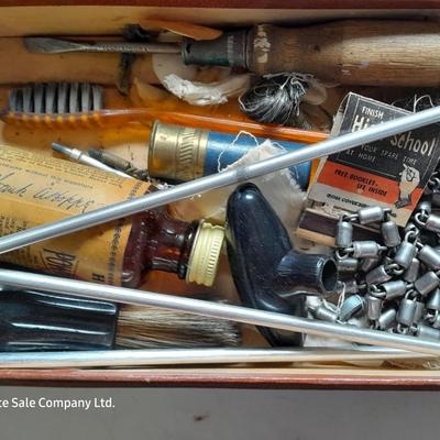 Vintage gun cleaning kit with tools and accessories