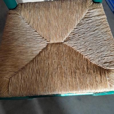 Green Ratton woven seat barstool.