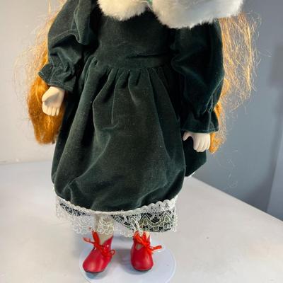 WINTER GIRL IN VELVET AND FUR PORCELAIN DOLL WITH STAND