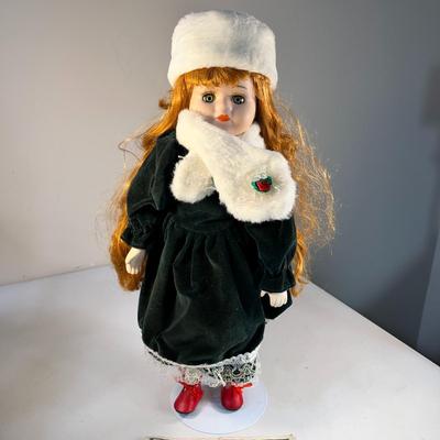 WINTER GIRL IN VELVET AND FUR PORCELAIN DOLL WITH STAND