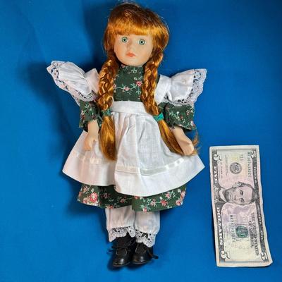 PINAFORE GIRL PORCELAIN DOLL WITH LONG RED BRAIDS