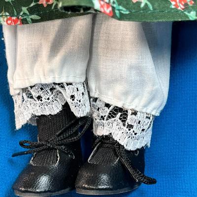 PINAFORE GIRL PORCELAIN DOLL WITH LONG RED BRAIDS