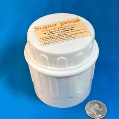 HAND HELD "SUPER PRESS" CHEESE AND SPICE GRATER
