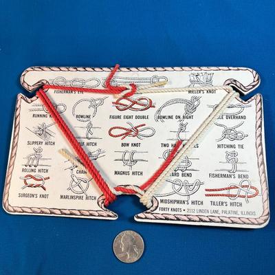 "FORTY KNOTS- LEARN TO TIE THEM" CARD WITH RED AND WHITE PRACTICE ROPE