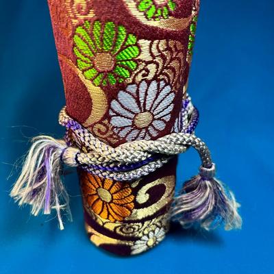 JAPANESE SCROLL DOLL/FIGURE WITH SILK BROCADE WRAPPING AND 6 FOOT SCROLL