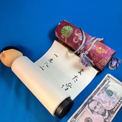 JAPANESE SCROLL DOLL/FIGURE WITH SILK BROCADE WRAPPING AND 6 FOOT SCROLL