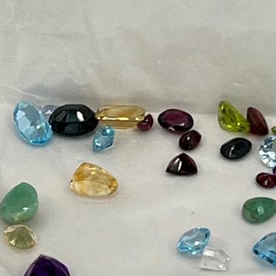 5 envelopes of faceted semo precious gemstones