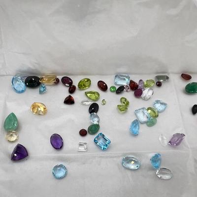 5 envelopes of faceted semo precious gemstones