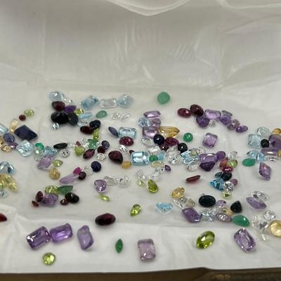 5 envelopes of faceted semo precious gemstones