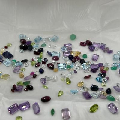5 envelopes of faceted semo precious gemstones