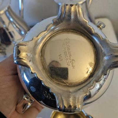Silverplate Service and Weighted Silver Candle Stick Holders