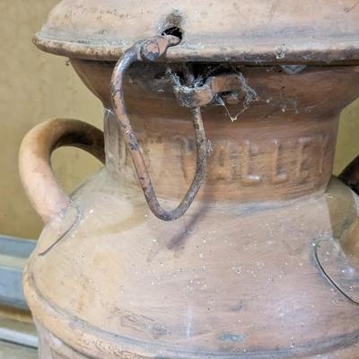 Foremost and Blue Valley Milk Churns