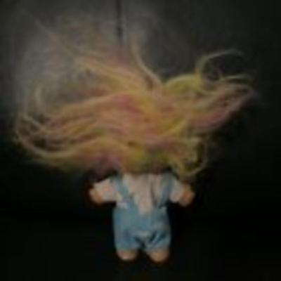 Rainbow Troll in overalls with ear pierce