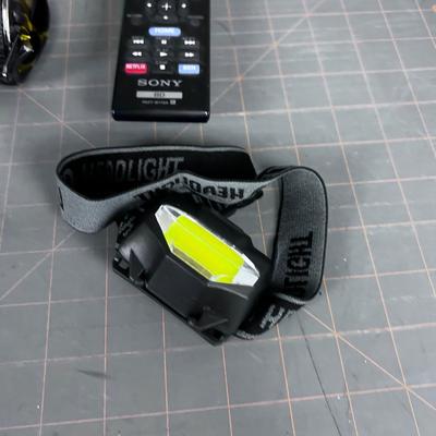 Misc. Electronics: Head Lamp, Skull Candy, Ear Buds