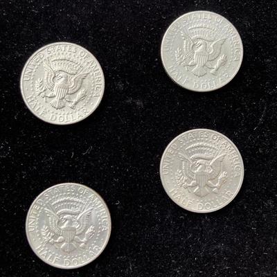 Four Kennedy Half Dollar Coins with 1983 P