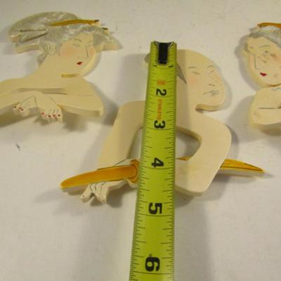 Two Sets of Asian Design Napkin Rings (Eight Pieces Total)