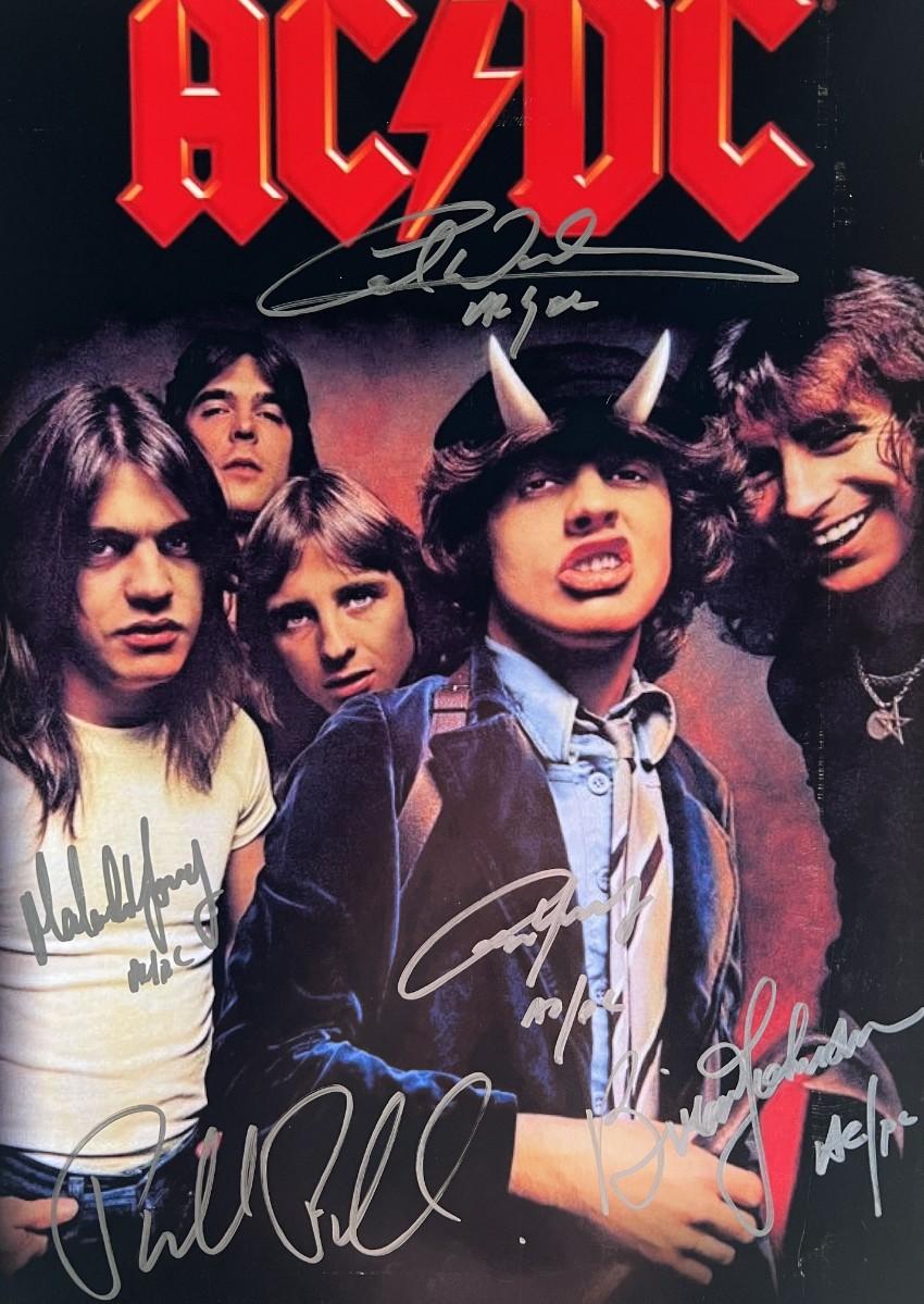 AC/DC band signed mini poster | EstateSales.org