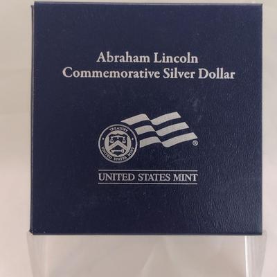 2009 U.S. Mint Abraham Lincoln Commemorative Silver Dollar Proof Coin (#59)