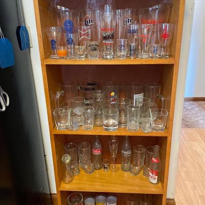 Bookshelf with collector glasses