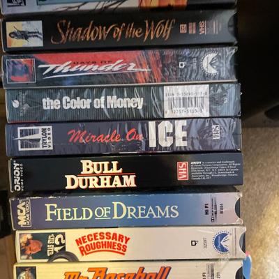 Huge lot of VHS tapes and holders